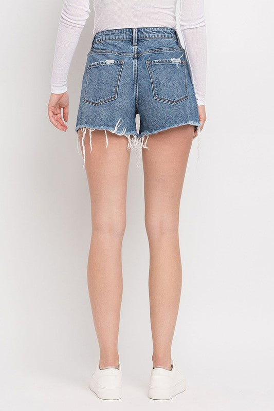 Super High Rise ShortsThe Super High Rise Shorts are the epitome of chic and edgy style. Made from comfortable stretch denim, these shorts feature a super high-rise waist that accentuates