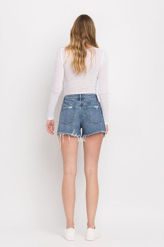 Super High Rise ShortsThe Super High Rise Shorts are the epitome of chic and edgy style. Made from comfortable stretch denim, these shorts feature a super high-rise waist that accentuates