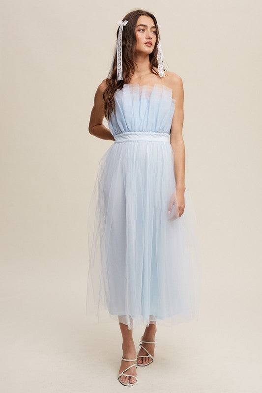 Paper Bag Frill Tulle Maxi DressThe Paper Bag Frill Tulle Maxi Dress exudes elegance and charm with its thoughtful design details. Featuring a removable and adjustable shoulder strap, it offers ver