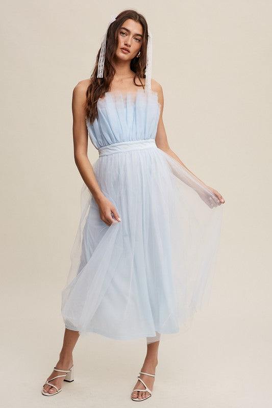 Paper Bag Frill Tulle Maxi DressThe Paper Bag Frill Tulle Maxi Dress exudes elegance and charm with its thoughtful design details. Featuring a removable and adjustable shoulder strap, it offers ver