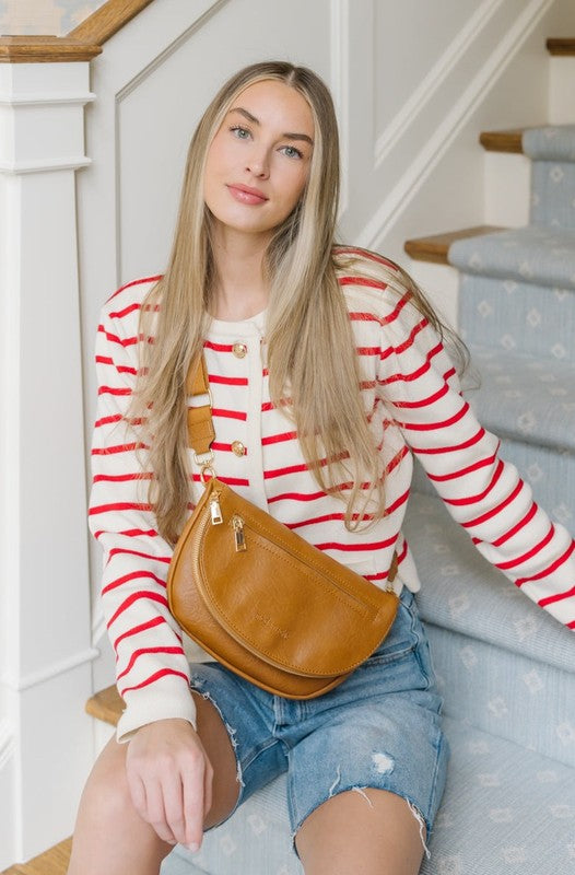 HOLLY FOLDOVER CROSSBODY BELT SHOULDER BAGThe ultimate in fashion and function, the Holly Crossbody is filled with details you'll obsess over. This crossbody has a wide zippered opening that makes it easy to