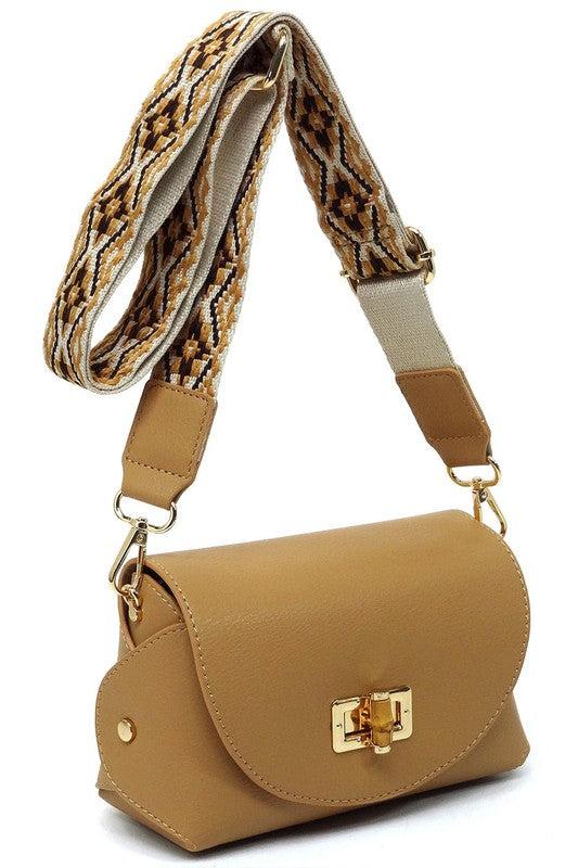 Bamboo Twist Lock Flap Crossbody BagBamboo Twist Lock Flap Crossbody Bag Faux vegan leather Turn-lock closure Gold-tone hardware Detachable shoulder strap (Guitar strap) L 7 * H 4.8 * W 3