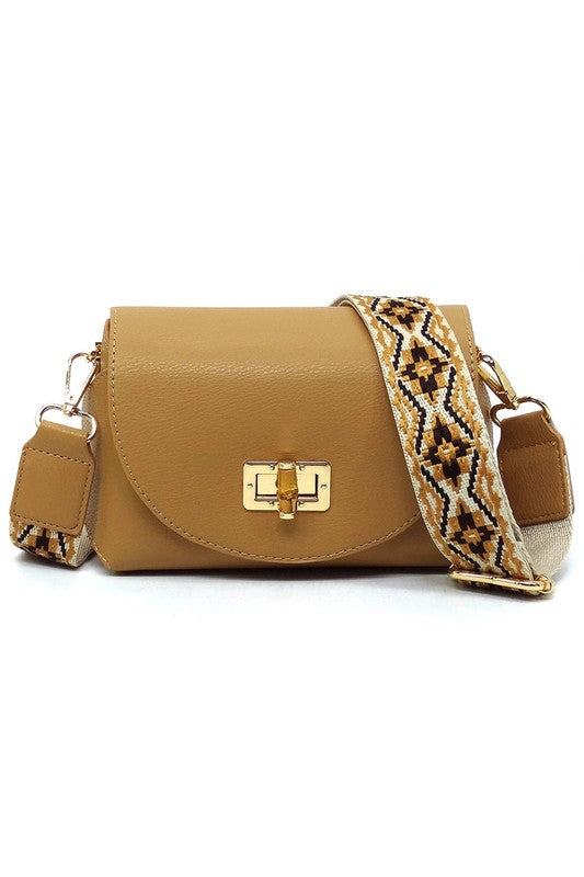 Bamboo Twist Lock Flap Crossbody BagBamboo Twist Lock Flap Crossbody Bag Faux vegan leather Turn-lock closure Gold-tone hardware Detachable shoulder strap (Guitar strap) L 7 * H 4.8 * W 3