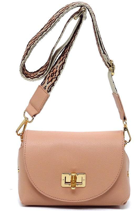 Bamboo Twist Lock Flap Crossbody BagBamboo Twist Lock Flap Crossbody Bag Faux vegan leather Turn-lock closure Gold-tone hardware Detachable shoulder strap (Guitar strap) L 7 * H 4.8 * W 3