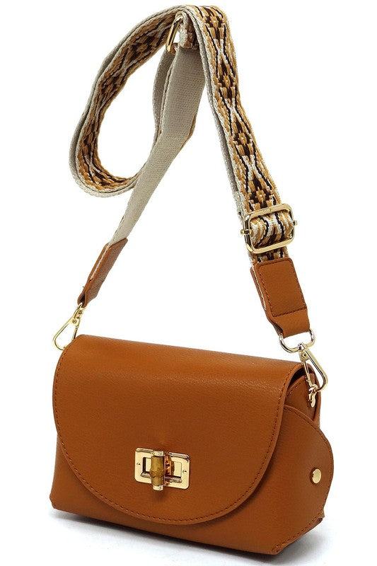 Bamboo Twist Lock Flap Crossbody BagBamboo Twist Lock Flap Crossbody Bag Faux vegan leather Turn-lock closure Gold-tone hardware Detachable shoulder strap (Guitar strap) L 7 * H 4.8 * W 3