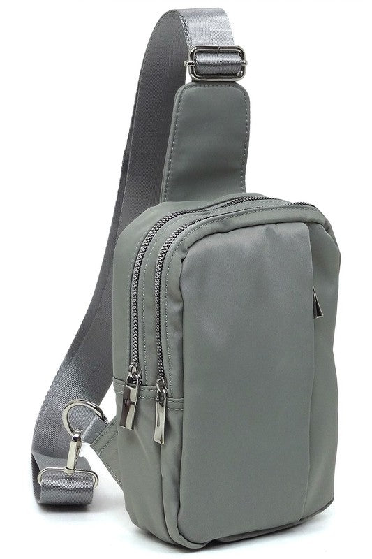 Fashion Nylon Sling Bag BackpackFashion Nylon Sling Bag Backpack Nylon fabric Leather free Zip top closure Silver-tone hardware Adjustable shoulder strap L 5.5 * H 9.5 * W 2