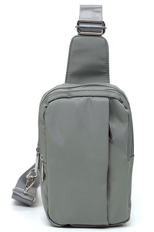 Fashion Nylon Sling Bag BackpackFashion Nylon Sling Bag Backpack Nylon fabric Leather free Zip top closure Silver-tone hardware Adjustable shoulder strap L 5.5 * H 9.5 * W 2