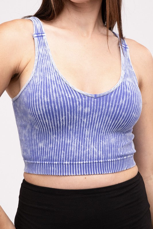 Washed Ribbed Cropped V-Neck Tank TopThe Washed Ribbed Cropped V-Neck Tank Top offers a stylish and comfortable option for your wardrobe. Made from ribbed fabric with a washed finish, it exudes a casual