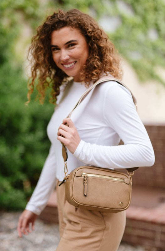 Gentry Crossbody Boho Shoulder Purse BagIntroducing the Gentry Crossbody, a must-have boho bag for the fashion-forward and free-spirited. This medium-sized crossbody is crafted from premium vegan leather t