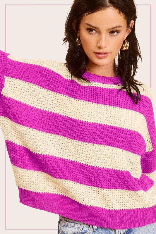 Striped Round Neck Loose Fit SweaterStylish pullover you would love to be in all day. Featured in a striped knit fabrication with long sleeve, round neckline and a loose fit. Match with any bottoms suc