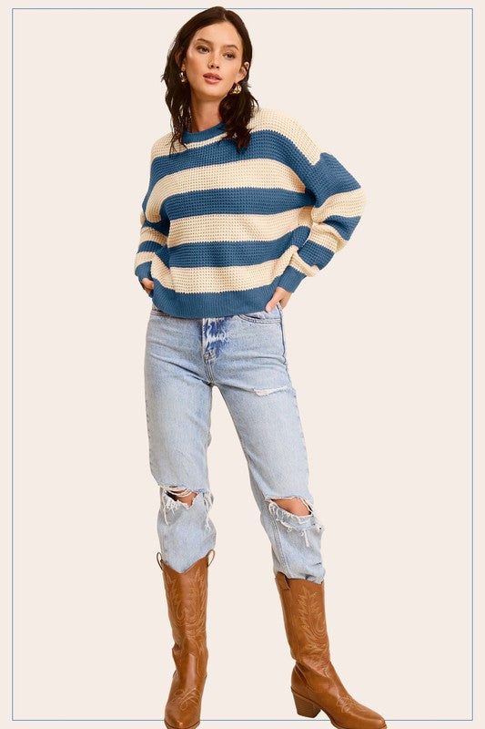 Striped Round Neck Loose Fit SweaterStylish pullover you would love to be in all day. Featured in a striped knit fabrication with long sleeve, round neckline and a loose fit. Match with any bottoms suc