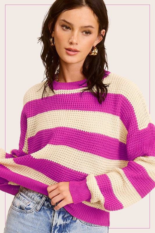 Striped Round Neck Loose Fit SweaterStylish pullover you would love to be in all day. Featured in a striped knit fabrication with long sleeve, round neckline and a loose fit. Match with any bottoms suc