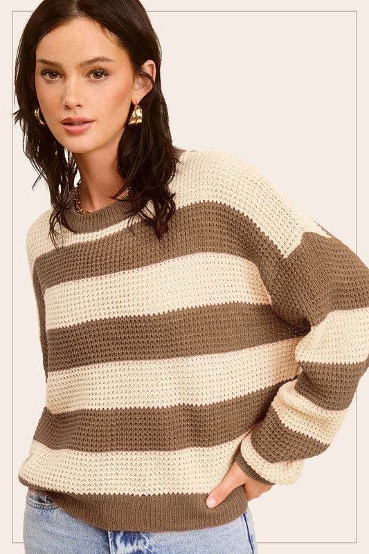 Striped Round Neck Loose Fit SweaterStylish pullover you would love to be in all day. Featured in a striped knit fabrication with long sleeve, round neckline and a loose fit. Match with any bottoms suc