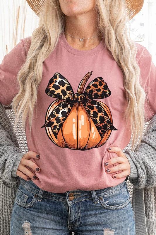 Coquette Bow Pumpkin Graphic T ShirtsCoquette Bow Pumpkin Graphic T Shirts.Unisex Crew Neck Short Sleeve Tees.Crafted from premium materials, tailored to your lifestyle, ensuring a comfortable fit for a