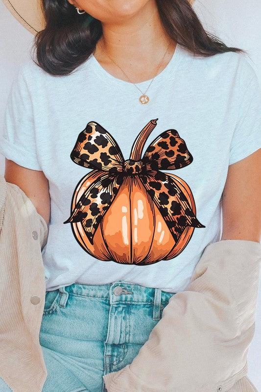 Coquette Bow Pumpkin Graphic T ShirtsCoquette Bow Pumpkin Graphic T Shirts.Unisex Crew Neck Short Sleeve Tees.Crafted from premium materials, tailored to your lifestyle, ensuring a comfortable fit for a