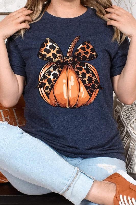 Coquette Bow Pumpkin Graphic T ShirtsCoquette Bow Pumpkin Graphic T Shirts.Unisex Crew Neck Short Sleeve Tees.Crafted from premium materials, tailored to your lifestyle, ensuring a comfortable fit for a