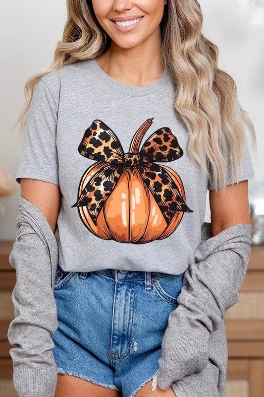 Coquette Bow Pumpkin Graphic T ShirtsCoquette Bow Pumpkin Graphic T Shirts.Unisex Crew Neck Short Sleeve Tees.Crafted from premium materials, tailored to your lifestyle, ensuring a comfortable fit for a