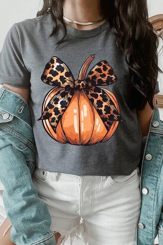 Coquette Bow Pumpkin Graphic T ShirtsCoquette Bow Pumpkin Graphic T Shirts.Unisex Crew Neck Short Sleeve Tees.Crafted from premium materials, tailored to your lifestyle, ensuring a comfortable fit for a