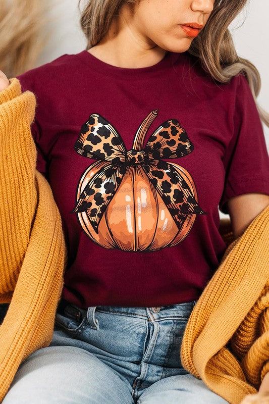 Coquette Bow Pumpkin Graphic T ShirtsCoquette Bow Pumpkin Graphic T Shirts.Unisex Crew Neck Short Sleeve Tees.Crafted from premium materials, tailored to your lifestyle, ensuring a comfortable fit for a