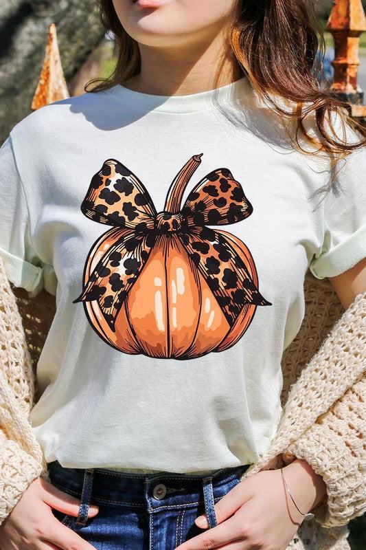 Coquette Bow Pumpkin Graphic T ShirtsCoquette Bow Pumpkin Graphic T Shirts.Unisex Crew Neck Short Sleeve Tees.Crafted from premium materials, tailored to your lifestyle, ensuring a comfortable fit for a