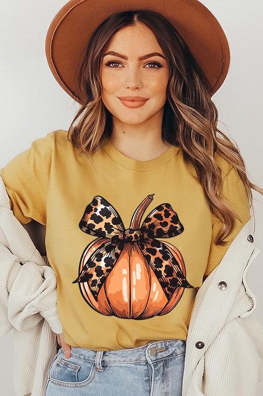 Coquette Bow Pumpkin Graphic T ShirtsCoquette Bow Pumpkin Graphic T Shirts.Unisex Crew Neck Short Sleeve Tees.Crafted from premium materials, tailored to your lifestyle, ensuring a comfortable fit for a