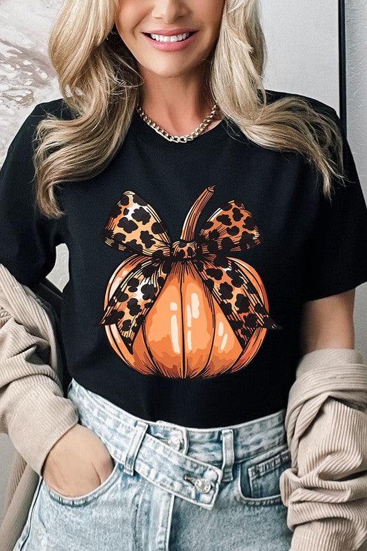 Coquette Bow Pumpkin Graphic T ShirtsCoquette Bow Pumpkin Graphic T Shirts.Unisex Crew Neck Short Sleeve Tees.Crafted from premium materials, tailored to your lifestyle, ensuring a comfortable fit for a