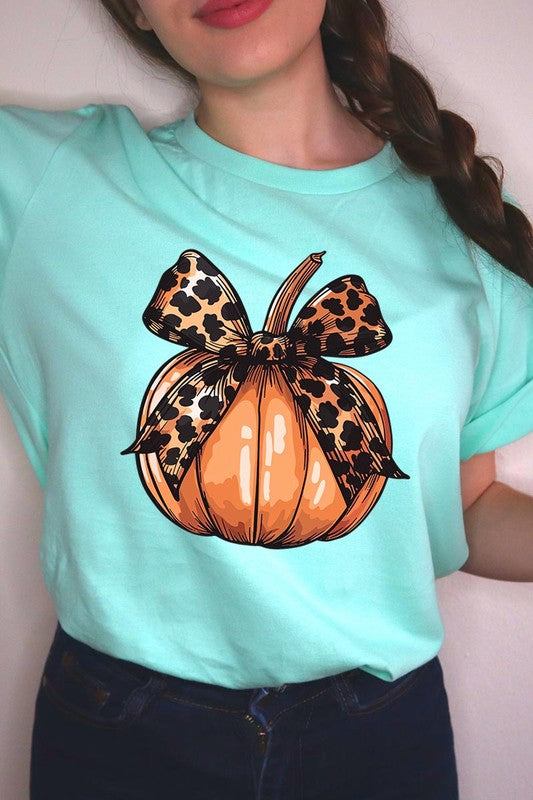 Coquette Bow Pumpkin Graphic T ShirtsCoquette Bow Pumpkin Graphic T Shirts.Unisex Crew Neck Short Sleeve Tees.Crafted from premium materials, tailored to your lifestyle, ensuring a comfortable fit for a