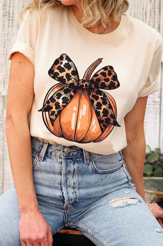 Coquette Bow Pumpkin Graphic T ShirtsCoquette Bow Pumpkin Graphic T Shirts.Unisex Crew Neck Short Sleeve Tees.Crafted from premium materials, tailored to your lifestyle, ensuring a comfortable fit for a