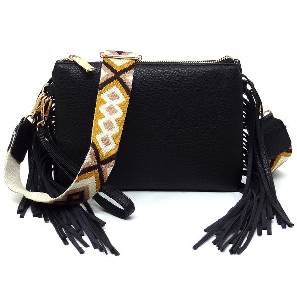 Aztec Guitar Strap Fringe Clutch Crossbody BagAztec Guitar Strap Fringe Clutch Crossbody Bag Faux vegan leather Zip top closure Gold-tone hardware Detachable shoulder strap L 8.5 * H 6 * W 3