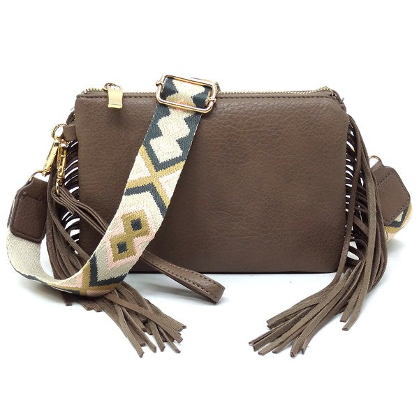 Aztec Guitar Strap Fringe Clutch Crossbody BagAztec Guitar Strap Fringe Clutch Crossbody Bag Faux vegan leather Zip top closure Gold-tone hardware Detachable shoulder strap L 8.5 * H 6 * W 3