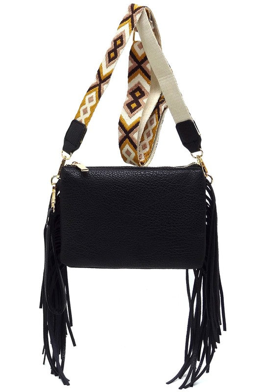 Aztec Guitar Strap Fringe Clutch Crossbody BagAztec Guitar Strap Fringe Clutch Crossbody Bag Faux vegan leather Zip top closure Gold-tone hardware Detachable shoulder strap L 8.5 * H 6 * W 3