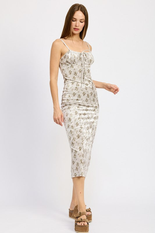 PRINTED SPAGHETTI STRAP MIDI DRESSSIZE &amp; FIT :MODEL WEARS SIZE SMALLMODEL'S HEIGHT 5'9Made In: IMPORTEDFabric Contents: 100% POLYESTERLINING: 100% POLYESTER