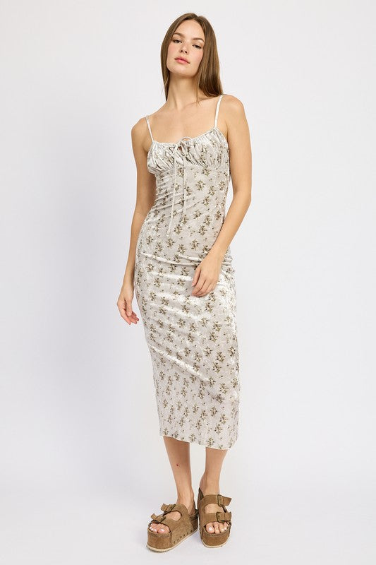 PRINTED SPAGHETTI STRAP MIDI DRESSSIZE &amp; FIT :MODEL WEARS SIZE SMALLMODEL'S HEIGHT 5'9Made In: IMPORTEDFabric Contents: 100% POLYESTERLINING: 100% POLYESTER