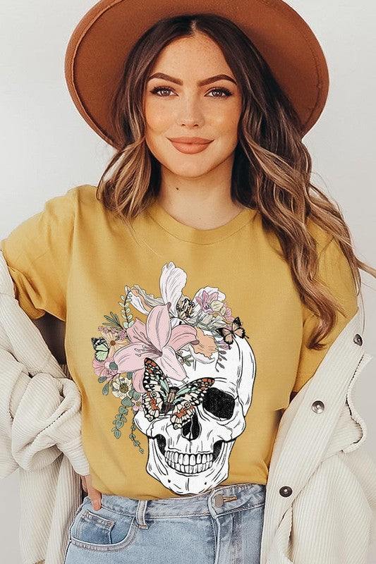 Floral Skull Graphic TeeFloral Skull Graphic Tee.Unisex Crew Neck Short Sleeve Tees.Crafted from premium materials, tailored to your lifestyle, ensuring a comfortable fit for any occasion.F