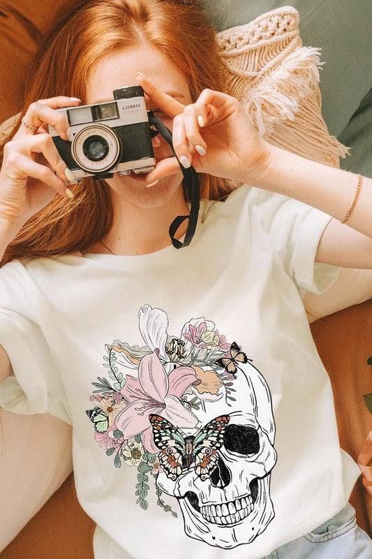 Floral Skull Graphic TeeFloral Skull Graphic Tee.Unisex Crew Neck Short Sleeve Tees.Crafted from premium materials, tailored to your lifestyle, ensuring a comfortable fit for any occasion.F