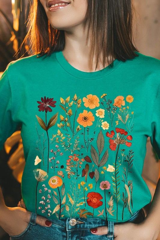 Botanical Wildflowers Graphic TeeBotanical Wildflowers Graphic Tee.Unisex Crew Neck Short Sleeve Tees.Crafted from premium materials, tailored to your lifestyle, ensuring a comfortable fit for any o