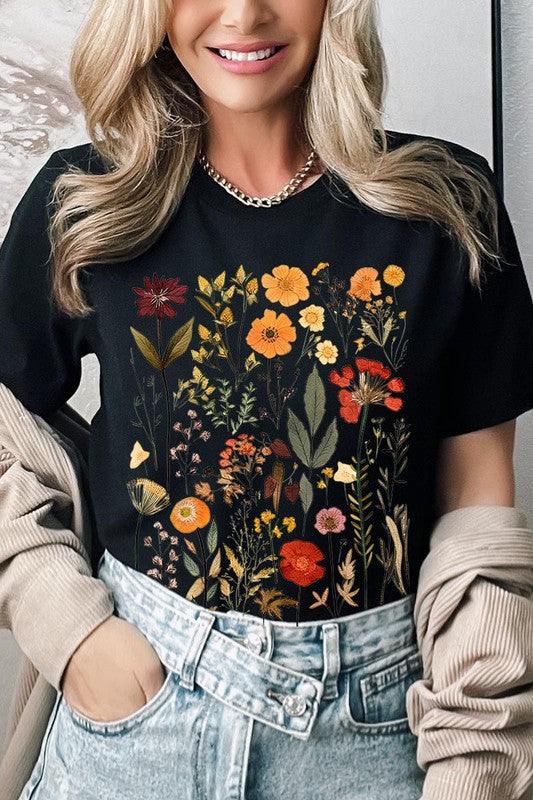 Botanical Wildflowers Graphic TeeBotanical Wildflowers Graphic Tee.Unisex Crew Neck Short Sleeve Tees.Crafted from premium materials, tailored to your lifestyle, ensuring a comfortable fit for any o