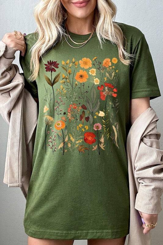 Botanical Wildflowers Graphic TeeBotanical Wildflowers Graphic Tee.Unisex Crew Neck Short Sleeve Tees.Crafted from premium materials, tailored to your lifestyle, ensuring a comfortable fit for any o