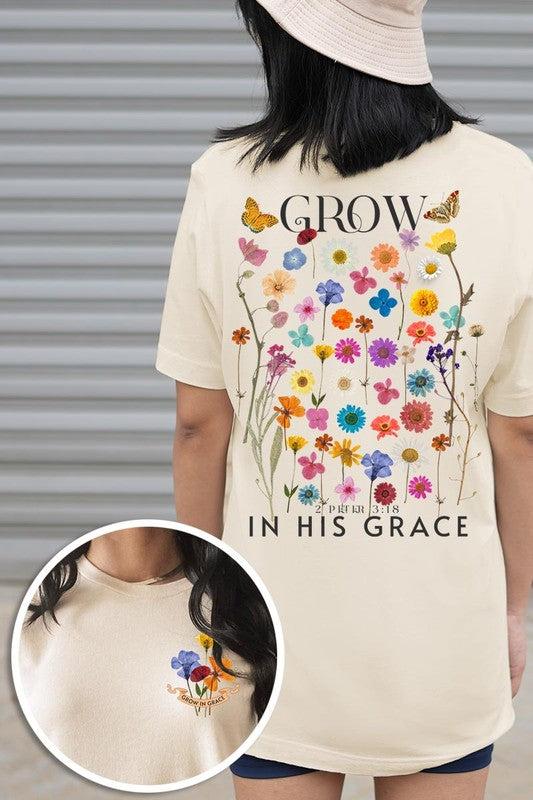 Wild Flowers Grow In Grace Graphic TeeWild Flowers Grow In Grace Front and Back Graphic Tee.Unisex Crew Neck Short Sleeve Tees.Crafted from premium materials, tailored to your lifestyle, ensuring a comfo