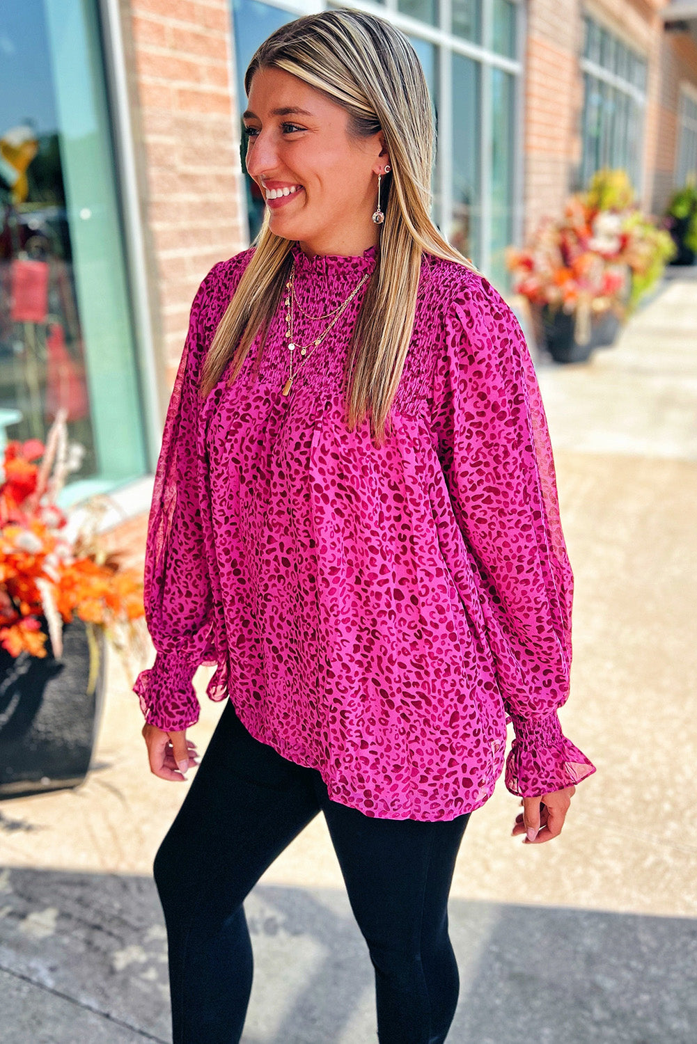 Rose Leopard Shirred Puff Sleeve Flowy BlouseMaterial:100%Polyester



		The blouse has a flowy silhouette, meaning it is loose and relaxed, draping away from the body. 
	
	
		The flowy silhouette of the b