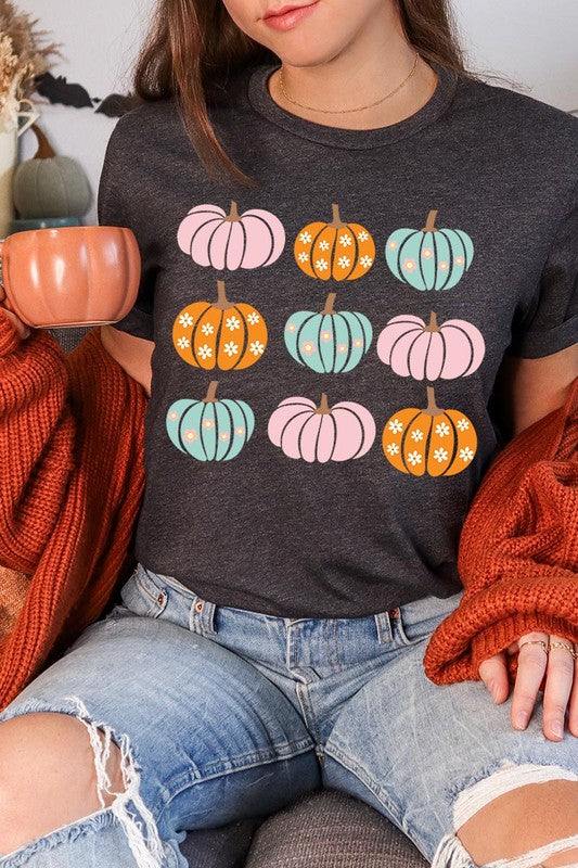 Cute Groovy Pumpkins  Graphic TeeCute Groovy Pumpkins Graphic Tee.Unisex Crew Neck Short Sleeve Tees.Crafted from premium materials, tailored to your lifestyle, ensuring a comfortable fit for any oc