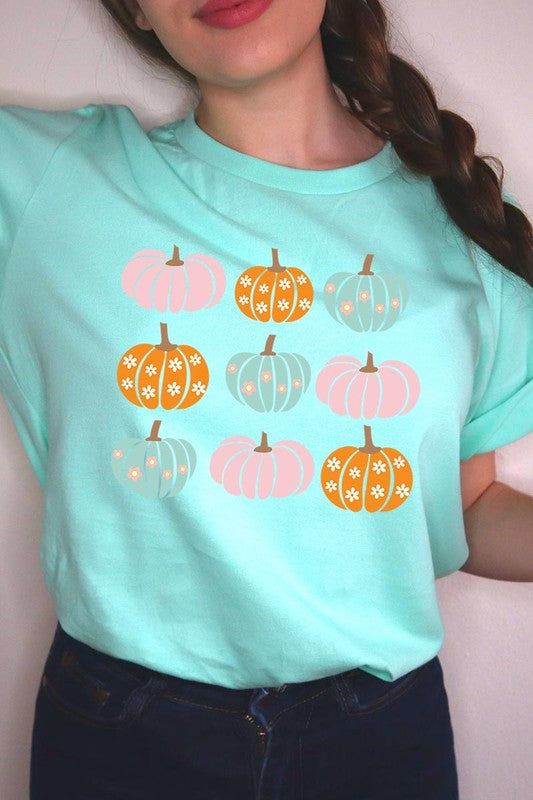 Cute Groovy Pumpkins  Graphic TeeCute Groovy Pumpkins Graphic Tee.Unisex Crew Neck Short Sleeve Tees.Crafted from premium materials, tailored to your lifestyle, ensuring a comfortable fit for any oc