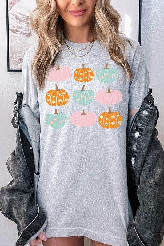 Cute Groovy Pumpkins  Graphic TeeCute Groovy Pumpkins Graphic Tee.Unisex Crew Neck Short Sleeve Tees.Crafted from premium materials, tailored to your lifestyle, ensuring a comfortable fit for any oc