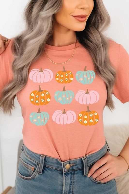 Cute Groovy Pumpkins  Graphic TeeCute Groovy Pumpkins Graphic Tee.Unisex Crew Neck Short Sleeve Tees.Crafted from premium materials, tailored to your lifestyle, ensuring a comfortable fit for any oc