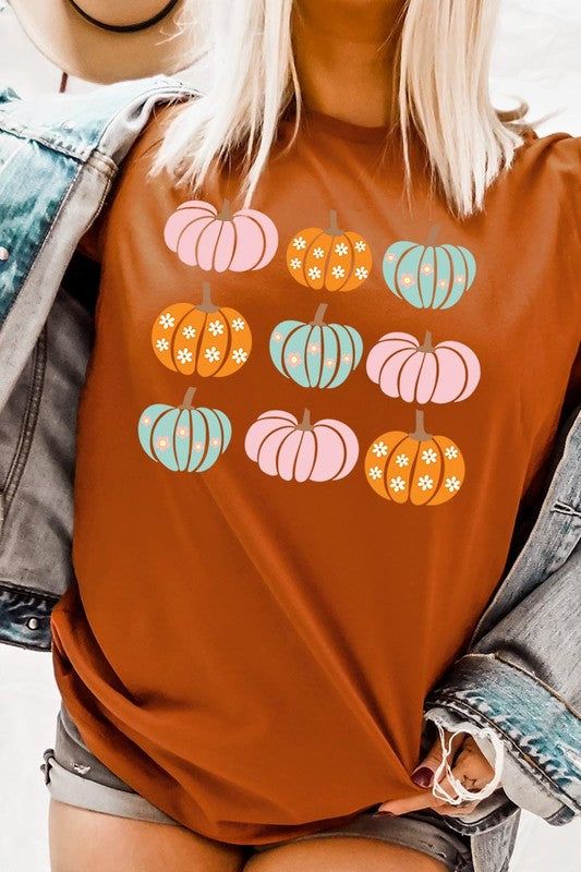 Cute Groovy Pumpkins  Graphic TeeCute Groovy Pumpkins Graphic Tee.Unisex Crew Neck Short Sleeve Tees.Crafted from premium materials, tailored to your lifestyle, ensuring a comfortable fit for any oc