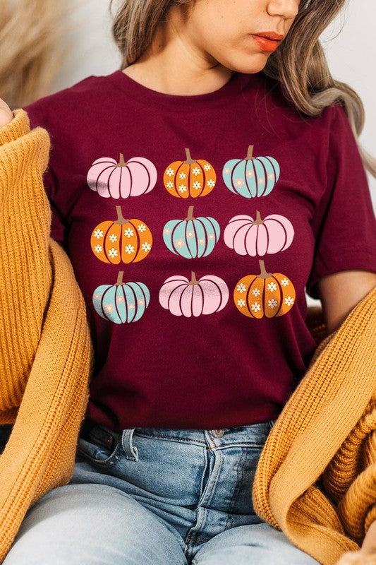 Cute Groovy Pumpkins  Graphic TeeCute Groovy Pumpkins Graphic Tee.Unisex Crew Neck Short Sleeve Tees.Crafted from premium materials, tailored to your lifestyle, ensuring a comfortable fit for any oc