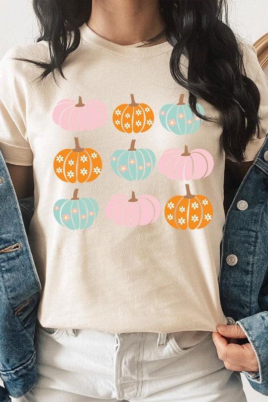 Cute Groovy Pumpkins  Graphic TeeCute Groovy Pumpkins Graphic Tee.Unisex Crew Neck Short Sleeve Tees.Crafted from premium materials, tailored to your lifestyle, ensuring a comfortable fit for any oc