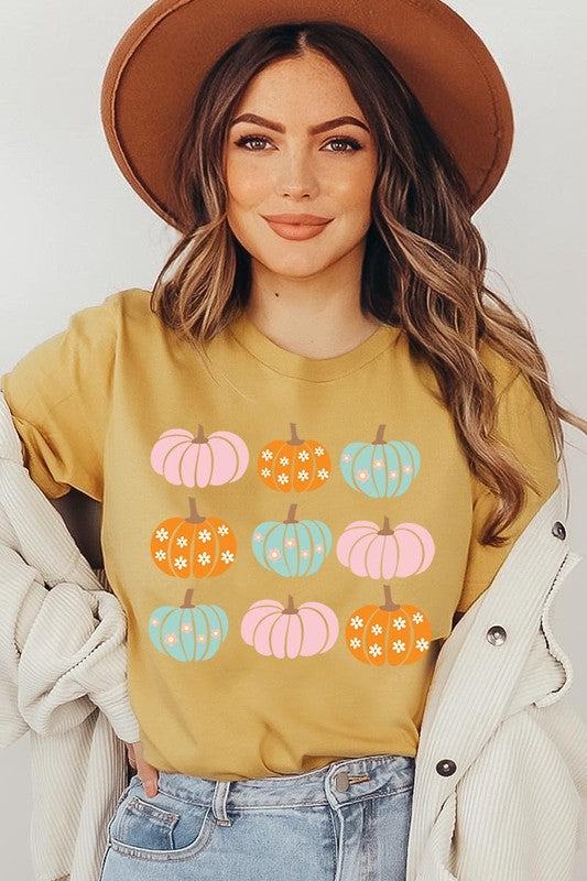 Cute Groovy Pumpkins  Graphic TeeCute Groovy Pumpkins Graphic Tee.Unisex Crew Neck Short Sleeve Tees.Crafted from premium materials, tailored to your lifestyle, ensuring a comfortable fit for any oc