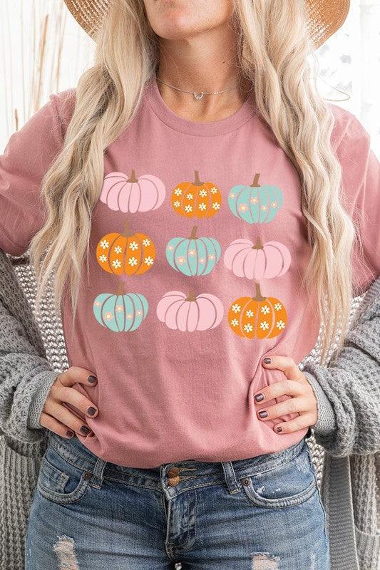 Cute Groovy Pumpkins  Graphic TeeCute Groovy Pumpkins Graphic Tee.Unisex Crew Neck Short Sleeve Tees.Crafted from premium materials, tailored to your lifestyle, ensuring a comfortable fit for any oc