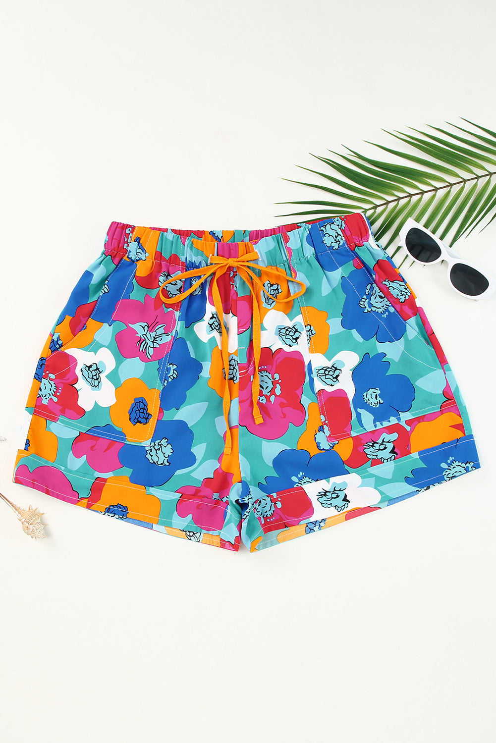 Multicolor Floral Print Drawstring Elastic Waist ShortsMaterial:100%Polyester



		The shorts are the perfect addition to any summer wardrobe, offering comfort and style in one chic package.
	
	
		With their vibrant